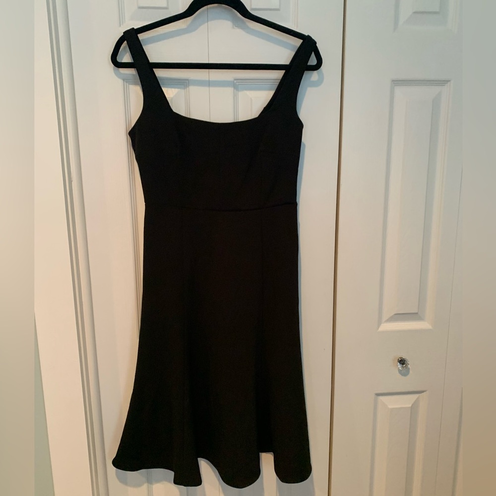 Calvin Klein classic black dress. NWT. Size 4. Runs large will fit 6-8.
